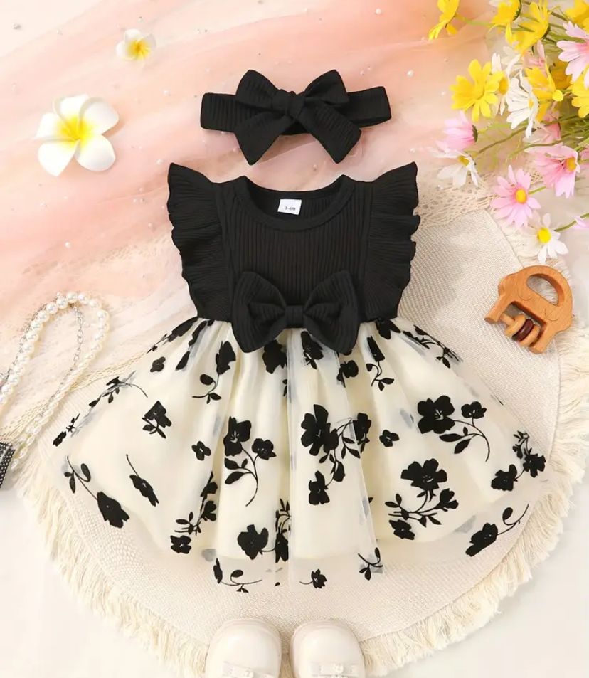 A Black And White Bowed Frock