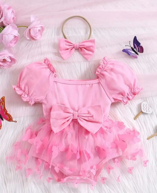 A Pink Colored Romper Dress 2 Piece