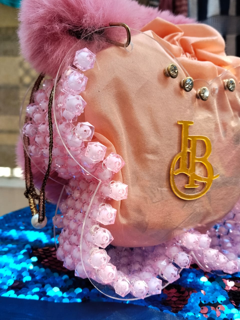 PINK ARCYLIC BAG IN BUTTERFLY DESIGN